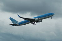 OO-TUC @ EGCC - TUI Airlines Belgium Boeing 767-341ER taking off from Manchester Airport. - by David Burrell