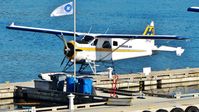 C-FFHQ @ CYHC - Harbour Air #203 docked at Coal Harbour terminal. - by M.L. Jacobs