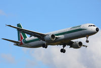 EI-IXJ @ EGLL - Alitalia - by Chris Hall