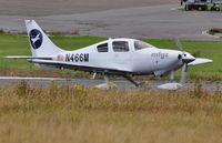 N466M @ EGFH - Visiting Lancair (now Cessna) Columbia 400 of Flight Maintenance Zurich Airport. - by Roger Winser