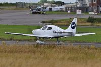 N466M @ EGFH - Visiting Lancair Columbia (now Cessna) 400 of Flight Maintenance Zurich Airport about to depart Runway 28. - by Roger Winser
