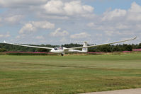 G-CKFV @ X5SB - DG Flugzeugbau LS-8T being launched for a cross country flight during The Northern Regional Gliding Competition, Sutton Bank, North Yorks, August 2nd 2013. - by Malcolm Clarke