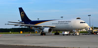 N136UP @ KRIC - Cargo ramp RIC - by Ronald Barker