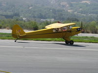 N98425 @ SZP - 1946 Piper J3C-65 CUB, Continental C90 90 Hp upgrade, landing roll Rwy 22 - by Doug Robertson