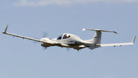 N228US @ EGFH - Diamond DA 42 pulling out from runway 22 at EGFH en route to Cannes France. - by Derek Flewin
