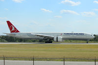TC-JJM @ CYYZ - This 2011 Boeing 777 has just touched down on runway 33L at Toronto Int'l Airport (CYYZ) - by Ron Coates
