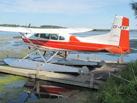 CF-FXP - This fire red Cessna looked great while resting at its home dock on Lake Scugog near Port Perry, Ontario. It must be loud when taking off among the small fishing boats.