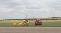 DF112 - Tiger Moth refueling at Duxford airfield - by David Lambert