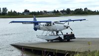 C-GHAG @ CYVR - Harbour Air #317 wheeled out of the Fraser River  to go to the hangar. - by M.L. Jacobs