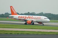 G-EZFN @ EGCC - Easyjet Airbus A319-111 taxiing at Manchester Airport. - by David Burrell