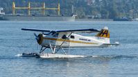 C-FJOS @ CYHC - Harbour Air #215 taxiing to terminal in Coal Harbour. - by M.L. Jacobs