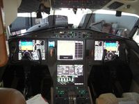 N47EG @ KMMU - Cockpit - by HughJ