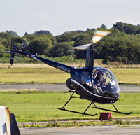 G-MDKD @ EGFH - EGFH based Robinson R22 BETA, newly arrived after a complete refit in California USA, replacing G-LINS, Operated by HeliAir. - by Derek Flewin