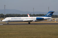 4O-AOP @ LOWW - Montenegro Airlines Fokker 100 - by Thomas Ranner