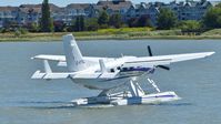 C-FTEL @ CYVR - Private Telus Kodiak taxiing out on the Fraser River. - by M.L. Jacobs