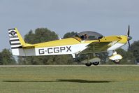 G-CGPX @ EGBK - Arriving at the 2013 Light Aircraft Association Rally at Sywell in the UK - by Terry Fletcher