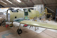 G-ENAA @ EGTN - 2 seat Supermarine Spitfire MK26B under construction at Enstone Airfield. This is part of the ambitious plan by the Enstone Flying Club to build 12 Spitfire replicas and form a squadron which will display at airshows and events around the country. - by Chris Hall