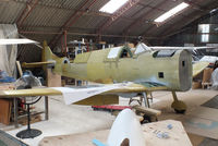 G-ENAA @ EGTN - 2 seat Supermarine Spitfire MK26B under construction at Enstone Airfield. This is part of the ambitious plan by the Enstone Flying Club to build 12 Spitfire replicas and form a squadron which will display at airshows and events around the country. - by Chris Hall