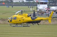 G-ORKI @ EGHR - London Helicopter AS350 parked in Goodwood. Re-registered to G-ERKN on 9-17-2013. - by FerryPNL