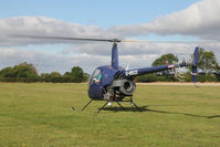 G-BSCE @ EGBR - Robinson R22 Beta at The Real Aeroplane Club's Helicopter Fly-In, Breighton Airfield, September 22 2013. - by Malcolm Clarke