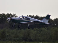 G-AYIG @ EGFH - Visiting Cherokee pulling out from runway 10 at EGFH. - by Derek Flewin