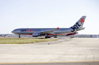 VH-EBA @ YSSY - Jetstar (VH-EBA) Airbus A330-200 waiting at Echo holding point at Sydney Airport. - by YSWG-photography