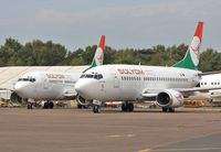 HA-SHA @ EGHH - Awaiting formal delivery to new start-up airline..parked with sister a/c to be HA-SHC - by John Coates