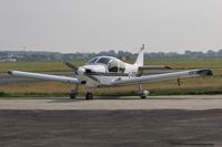 G-ROBN @ EGHH - Parked at DS Pilatus Centre - by John Coates