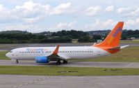 C-FYLC @ EGPH - Sunwing Boeing 737-8BK taxiing to runway 06 on a flight for Thomson holidays - by Mike stanners