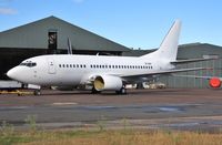VP-BKP @ EGHH - Just painted white..due to go to Solyom Airways Hungary - by John Coates