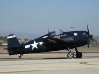 N1078Z @ CMA - 1963 S & S Special/Grumman F6F-5 HELLCAT 'MINSI III, P&W R-1820 Double Wasp 2,200 Hp, on flight line with rare N805WL White Lightning above on final for Rwy 26 - by Doug Robertson