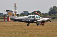 G-GDMW @ EGHH - Sporting latest colour scheme. - by John Coates