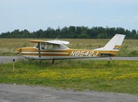 N8542J @ KMAL - This 1967 Cessna 150G sits tied down among the dandelions at the Malone-Dufort Airport in Malone NY. (KMAL) - by Ron Coates