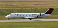 N8837B @ KGFK - Delta Connection Bombardier CRJ-200 landing on runway 17R. - by Kreg Anderson