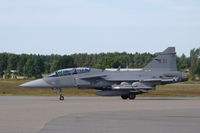 39831 @ ESOE - JAS39D two-seater of the Swedish Air Force arriving at Örebro airport, Sweden - by Henk van Capelle