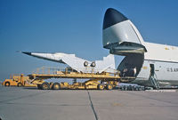 69-0023 @ KMCC - Onloading F5 aircraft for delivery to the middle East in 1977. - by Jim Steelquist