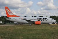 5N-BKR @ EGHH - Taxiing to depart after respray - by John Coates