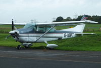 G-IOPT @ EGTR - with signs of damage on the front of the fuselage - by Chris Hall
