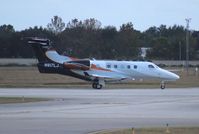 N917LJ @ ORL - Embraer Phenom 300 - by Florida Metal