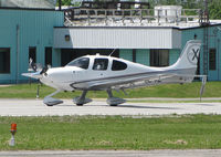 N254E @ CYKZ - This 2011 Cirrus SR22T taxis toward rwy 15 for takeoff at Buttonville Municipal Airport - by Ron Coates