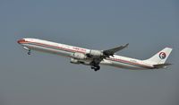 B-6050 @ KLAX - Departing LAX - by Todd Royer