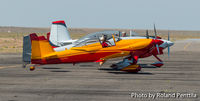 N3NU @ AEG - 3NU sits on the taxiway with other planes of the Chili Flight demonstration team. - by Roland Penttila