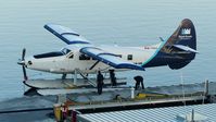 C-FHAA @ CYHC - Harbour Air #309 at Coal Harbour terminal in the early morning. - by M.L. Jacobs
