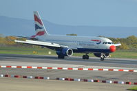 G-EUUK @ EGCC - British Airways Airbus A320-232 landing at Manchester Airport. - by David Burrell