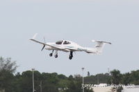 N424AM @ KSRQ - Diamond Twin Star (N424AM) departs Sarasota-Bradenton International Airport - by Donten Photography