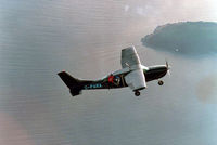 G-PARA - Skydivers climb out of G-PARA over The Gower on the run-in to Swansea Parachute Club Drop Zone. - by Les Cooper