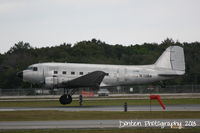 N12BA @ KSRQ - Douglas DC-3 (N12BA) arrives at Sarasota-Bradenton International Airport - by Donten Photography