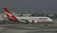 VH-OQB @ KLAX - Taxiing to gate at LAX - by Todd Royer