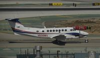 N506MV @ KLAX - Taxiing to parking at LAX - by Todd Royer
