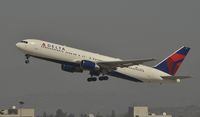 N137DL @ KLAX - Departing LAX - by Todd Royer